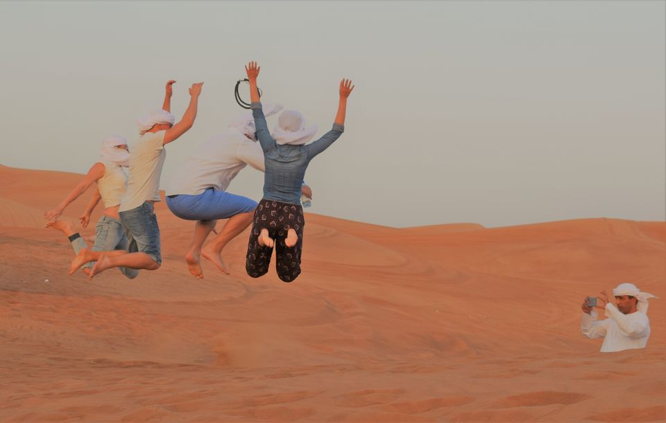 Dubai Desert Safari Red Dune: BBQ, Camel Ride & Sandboarding