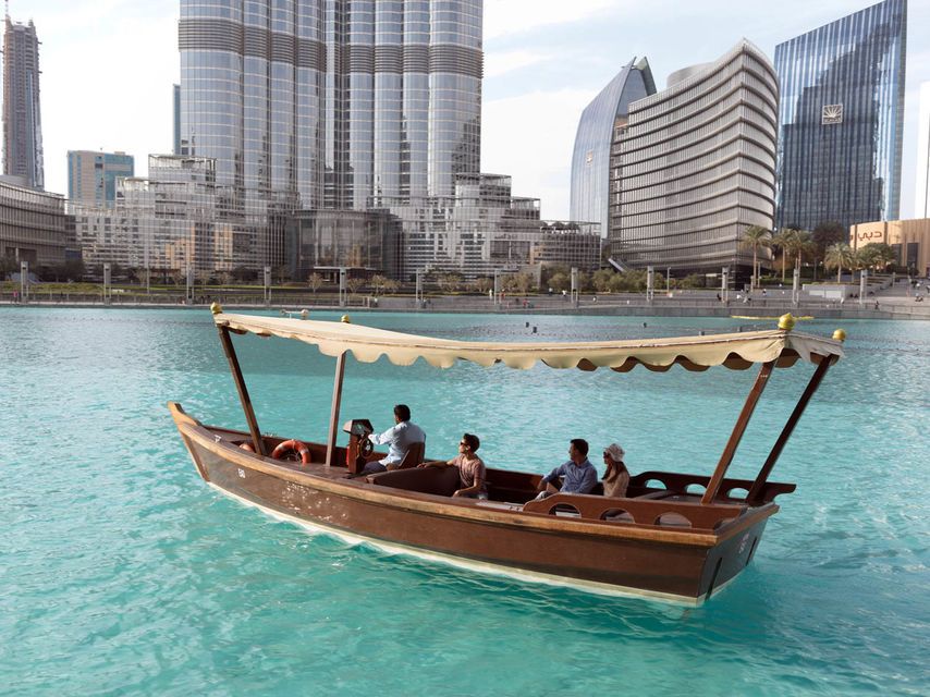 Dubai: Fountain Show and Burj Lake Ride by Traditional Boat