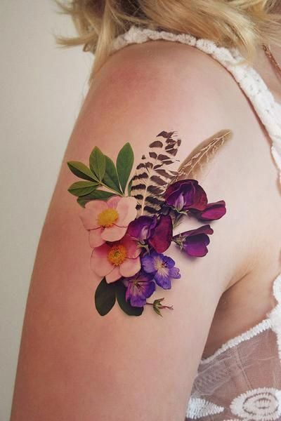Flowers And Feathers Tattoo