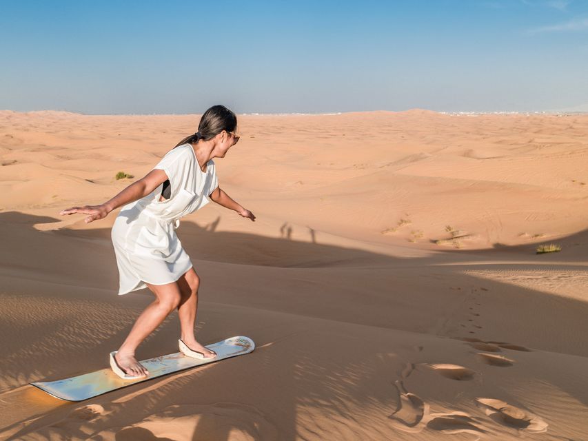 Red Dune Safari with Sandboarding, Camel Ride & BBQ Options